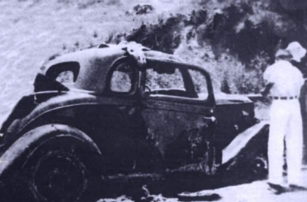Photo of 1933 Ford Coupe after being pulled from the Red River